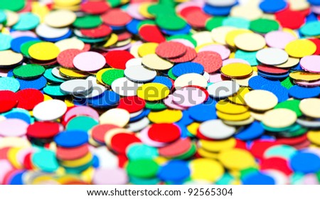 colorful confetti background. red, blue, green, yellow. selective focus