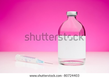 Medical still-life with a syringe and a drug vial