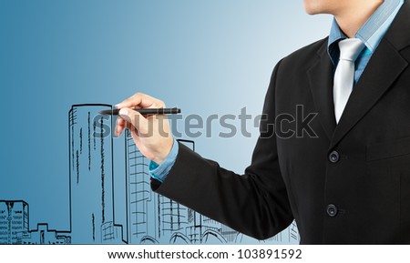 business man draw building and cityscape