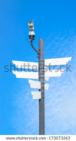 CCTV security camera wireless and blank signboard and blue sky