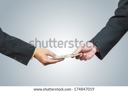 Businessman Hand And Money To Other For Corruption Concept