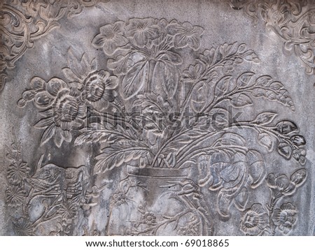 ancient flower engrave on wall