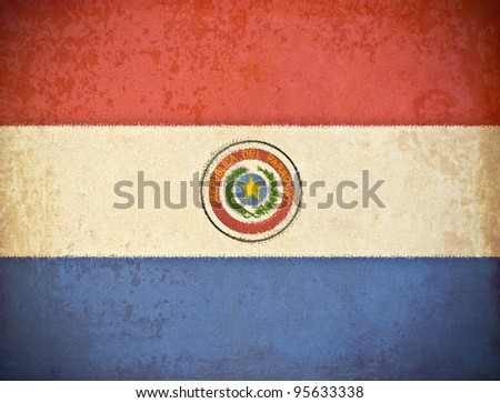 old grunge paper with Paraguay flag background