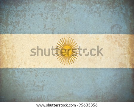 old grunge paper with Argentina flag background