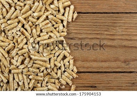 wood pellets on planks closeup