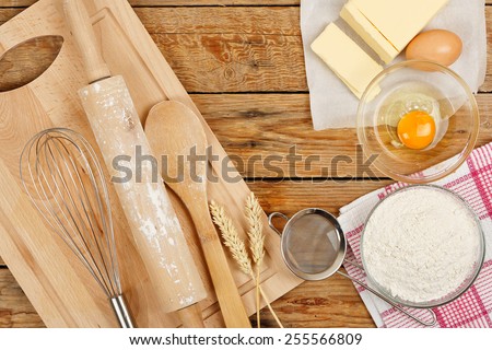 baking preparation, top view of a variety of baking utensils and ingredients