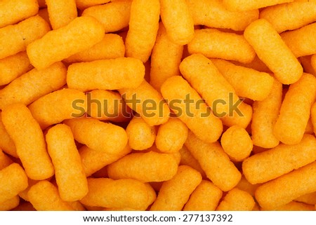 close up of cheese puffs, full frame