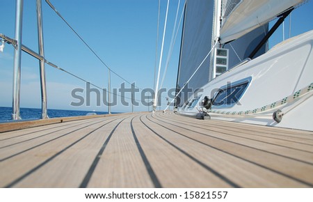 View along teak deck on sailboat
