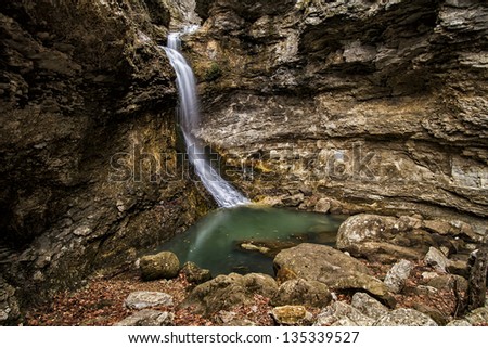 A horizontal image of Eden Falls in Arkansas.  It is just one of several waterfalls in Arkansas.