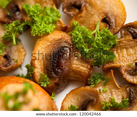Fried mushrooms with fresh parsley