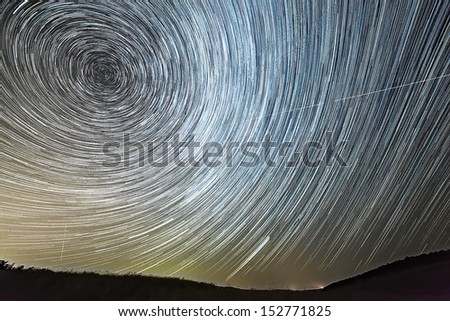 The motion of stars around Pole Star in the night city