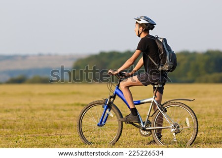 Tourist traveling by bike in the summer.