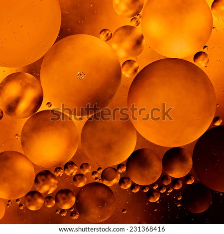 Abstract background of the oil droplets on the water.