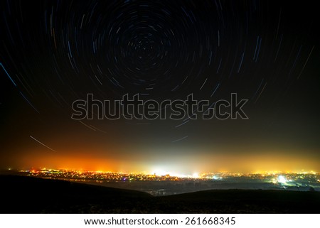 The motion of stars around Pole Star in the night city