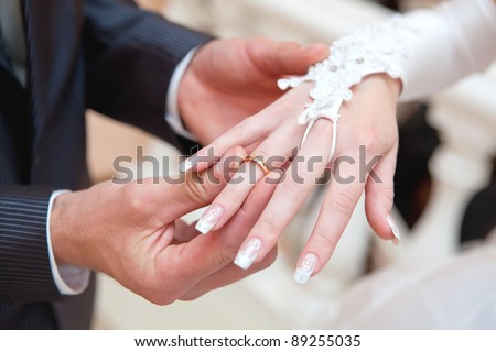 wedding dress and rings