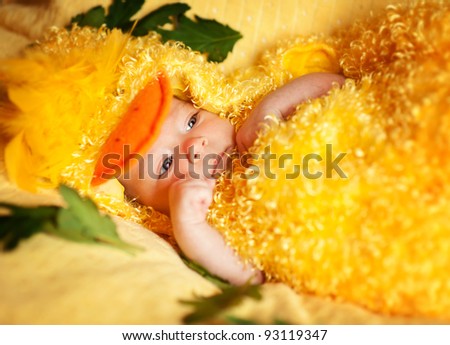 Infant baby in fancy chicken costume