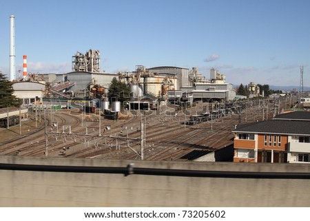 Railroad Cars Line Up To Be Loaded At Cement Manufacturing Plant Stock