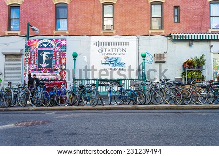 NEW YORK CITY, NEW YORK - NOV 10:  Bicycles are parked in front of subway entrace in Williamsburg in Brooklyn on November 10, 2014. Commuters often ride their bikes to subway stations around the city.