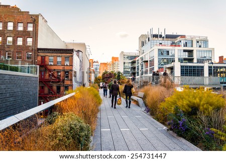 NEW YORK CITY - NOV 14: People stroll along the High Line Park in New York City on November 14, 2014. The High Line Park was formerly an elevated train track.