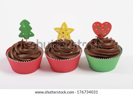 Chocolate cupcakes on white background