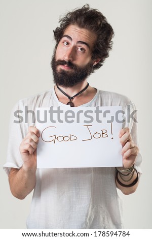 Man holding paper with messages \