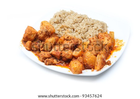 chopped chicken cooked in a sweet and sour sauce with rice, chinese food