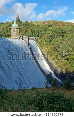 Penygarreg reservoir overflowing water, Elan Valley, Wales.