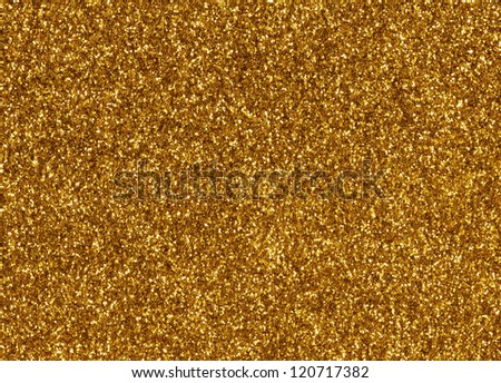 Gold glitter macro texture close up background.
