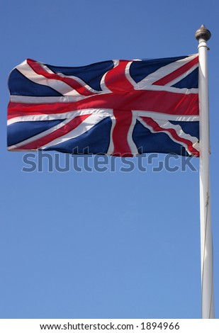 The Union flag (Union Jack) blowing in the wind on a sunny day