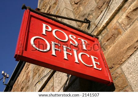 Red British Post Office sign.