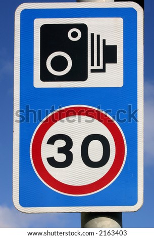 30 miles per hour speed and speed camera sign.