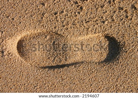 Shoe print in sand