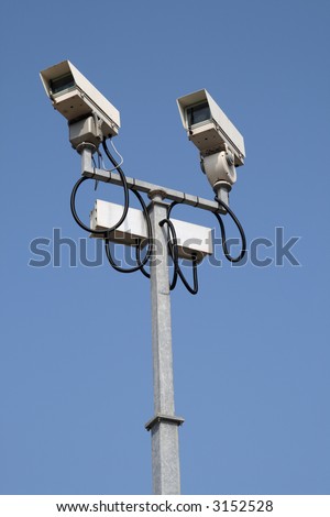 Two cctv street security cameras.