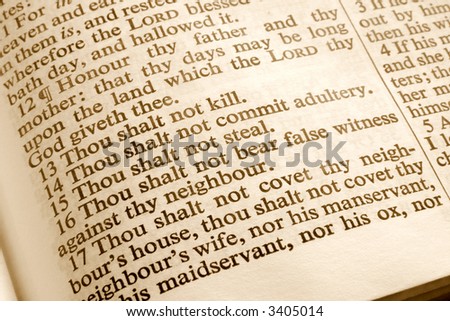 Close up of the 10 commandments in an old bible.