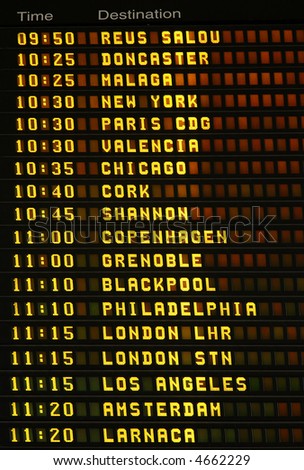 An electronic airport airplane departures board with times and destinations.