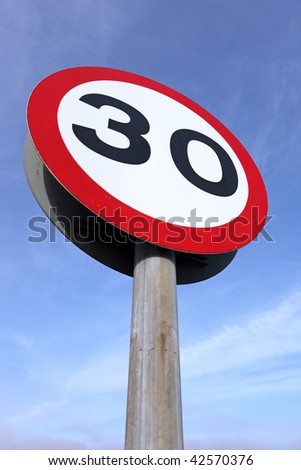 30 miles an hour speed limit sign.