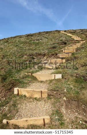 Steps to the top of a hill on the Cornish coast path.