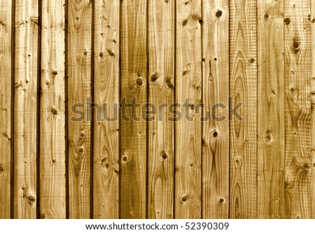 A brown wooden fence close up background.