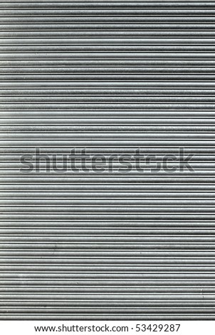 Closed large warehouse door security shutters.