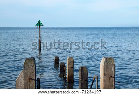 Aberystwyth wooden jetty with a calm sea, Wales UK.