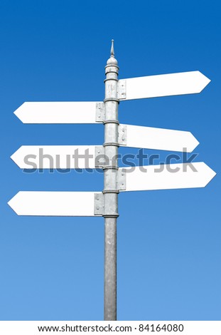 Multi-directional six way signpost with blank spaces for text.