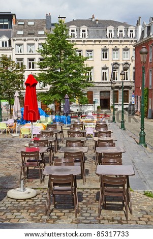 An empty patio on a quiet little plaza of Brussels, Belgium