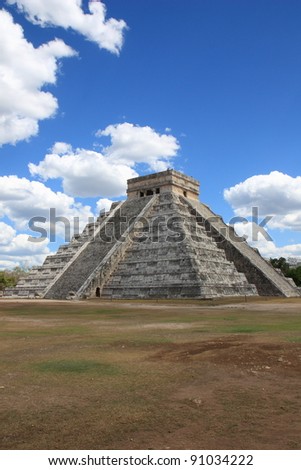 Tourists climb the top of the pyramid, highest Maya structure standing 40 Meters above the Yucatan jungles.