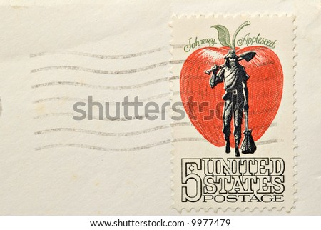 An aged five cent stamp with Johnny Appleseed on the front.