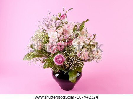 bunch of rose flowers on light pink background
