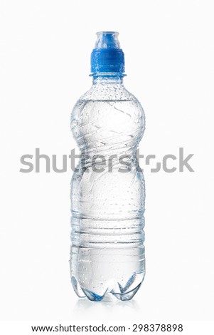 Small plastic water bottle with water drops on white background