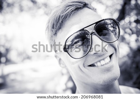 Happy man smiling, portrait.  Black and white images.