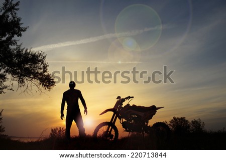rider and the bike at sunset.