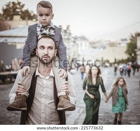 young family on a walk through the old districts of Kiev