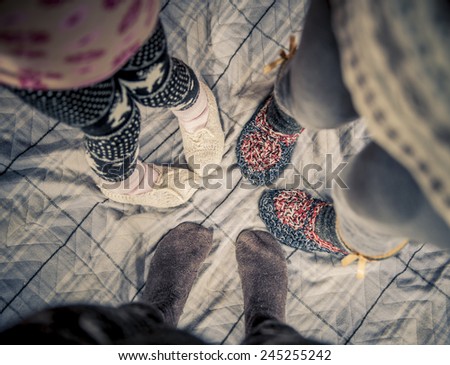 Family in wonderful stockings, feet close-up.